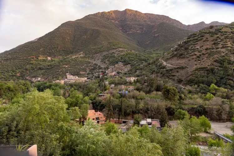 Moroccan village nestled in the Atlas Mountains, a great location for birding in Morocco.